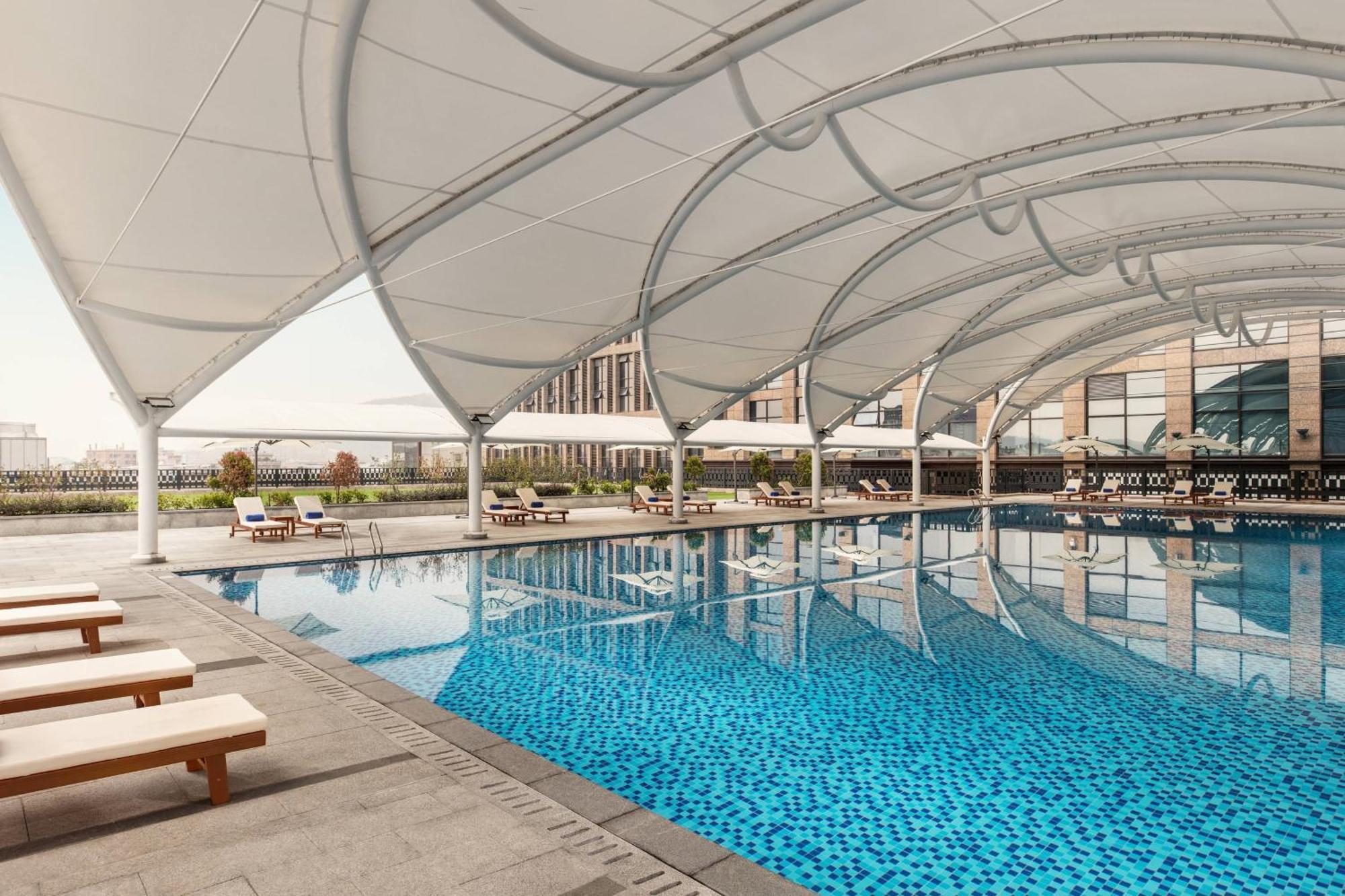 Отель Courtyard By Marriott Shunde Longjiang, Near Furniture Fair Экстерьер фото